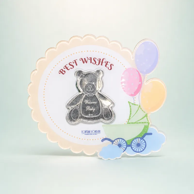 "Best Wishes" Scalloped Baby Card with "Welcome Baby" Teddy Silver Coin - 925 Sterling Silver on seaglass background