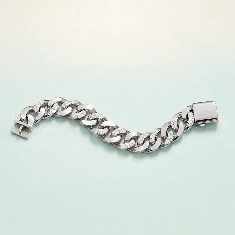 Chunky iced cuban-link white-CZ pavé bracelet - 925 Sterling Silver on seaglass background