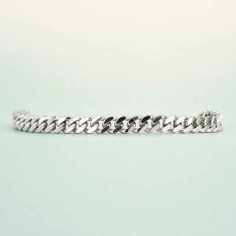 Slim flat curb-chain bracelet - 925 Sterling Silver on seaglass background
