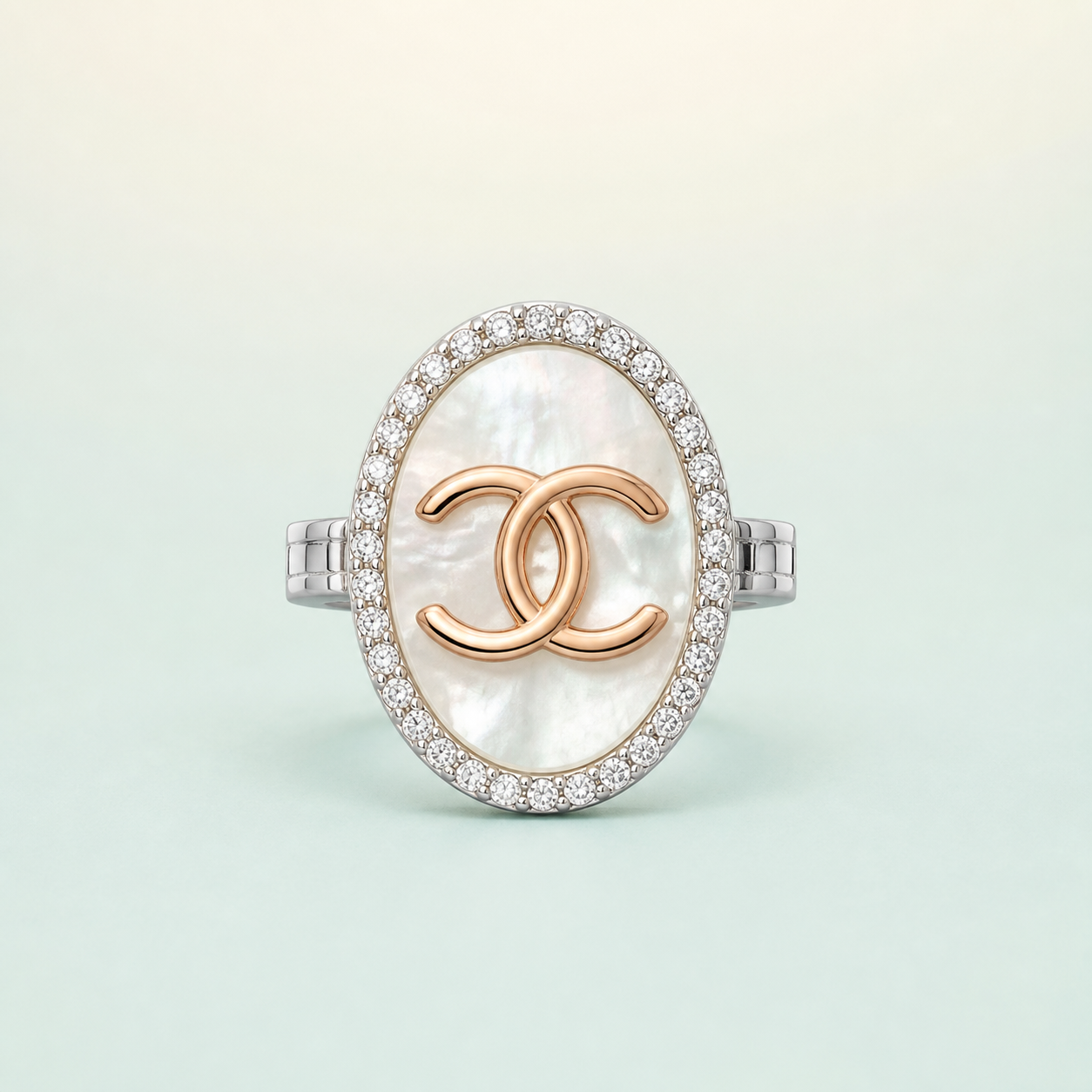 Oval Mother-of-Pearl Monogram Button Cover (925 silver · rose-gold interlocking-CC · CZ halo) - front - 925 Sterling Silver