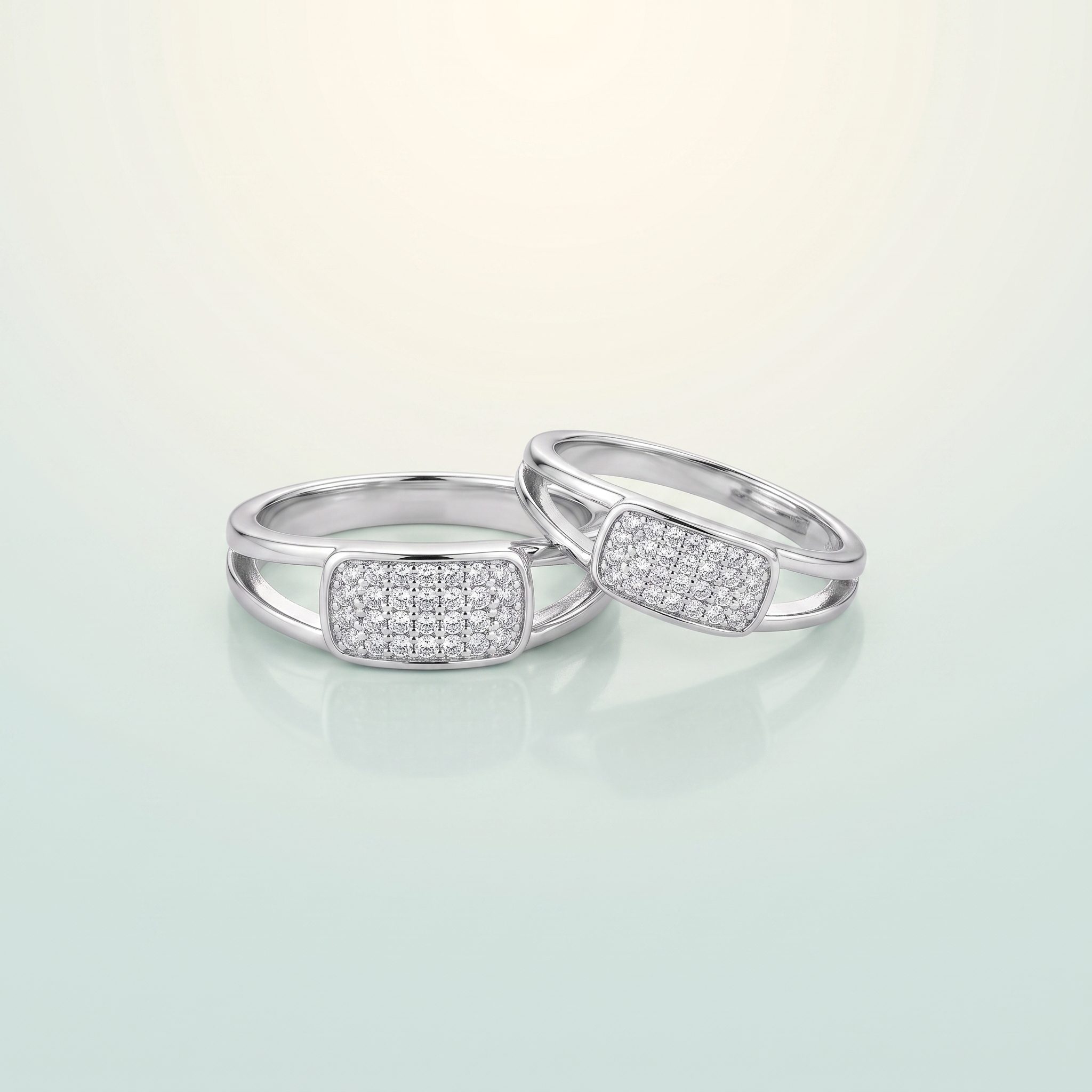 Split-Shank Bypass Pavé-CZ Couple Ring Set (bright rhodium silver · clear-white CZ) - 925 Sterling Silver on seaglass background