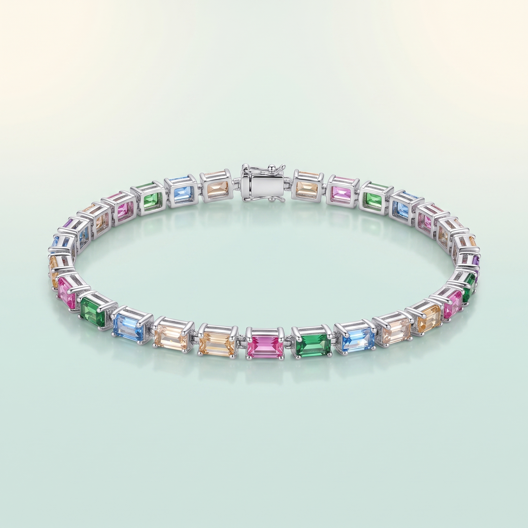 Multicolour Baguette-CZ Tennis Bracelet (bright polished silver · multicolour CZ) - 925 Sterling Silver on seaglass background