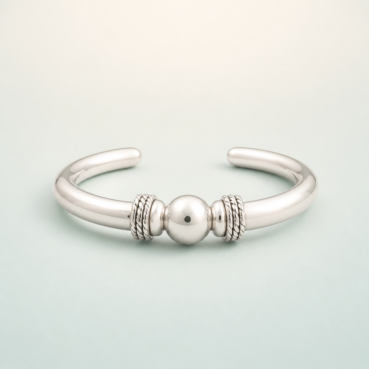 Ball-Center Rope-Ring Open Kada (bright polished silver) - 925 Sterling Silver on seaglass background