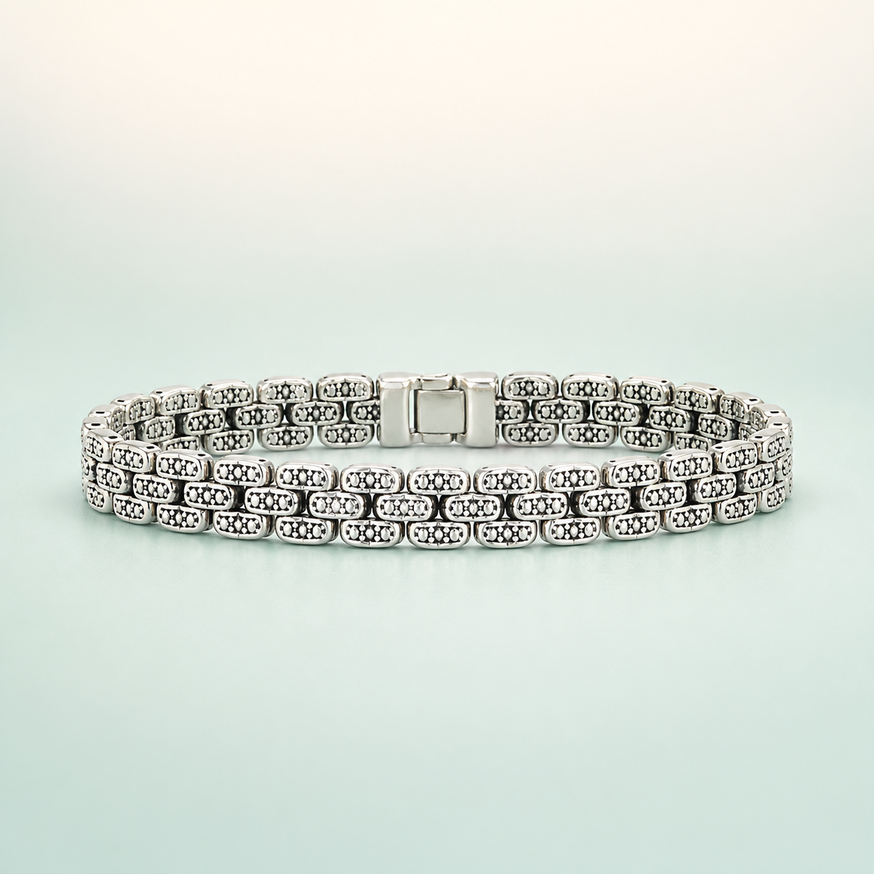 Double-Row Woven Flat Link Bracelet (oxidised silver, two-tone bright/dark) - 925 Sterling Silver on seaglass background