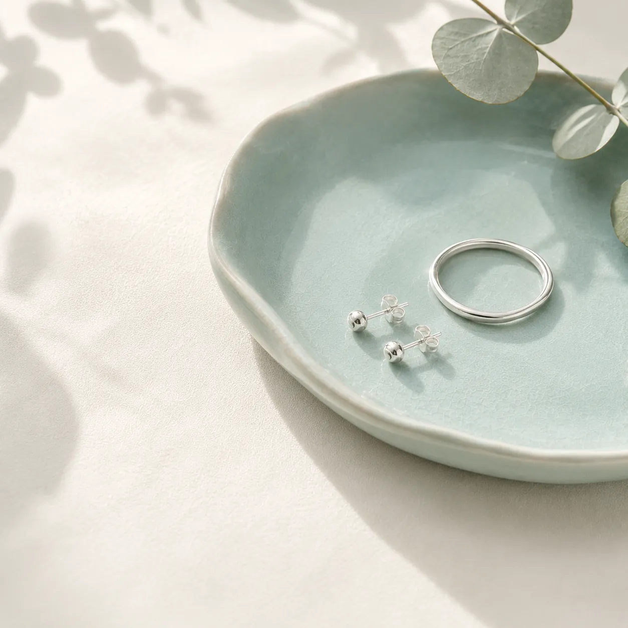 Sterling silver stud earrings styled for the under-two-thousand gift edit