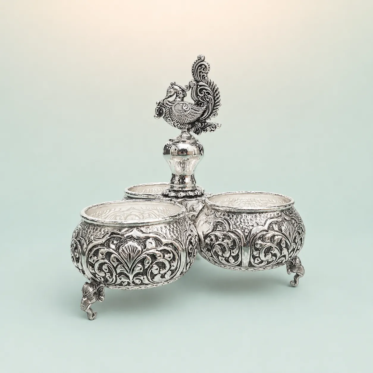 Three-Bowl Peacock Server on Elephant Feet on seaglass background