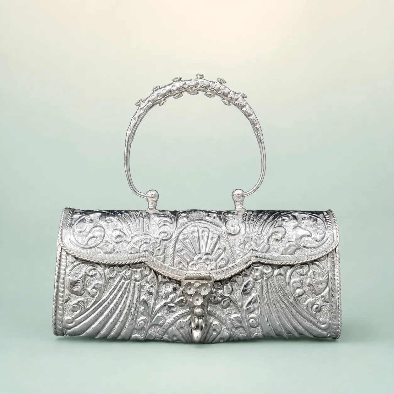Scroll-&-Scale Filigree Oblong Clutch — bright-polished oblong purse on seaglass background