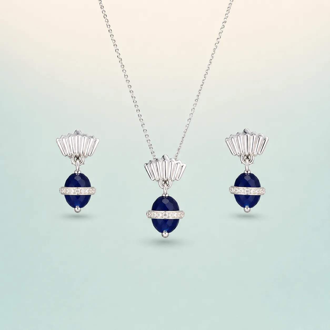 Sapphire-Blue Bead Drop Set — bright silver, fluted fan caps on seaglass background
