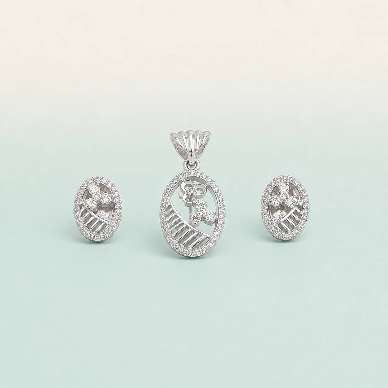 Orbit Rings Pavé Set — bright silver, concentric CZ circles on seaglass background